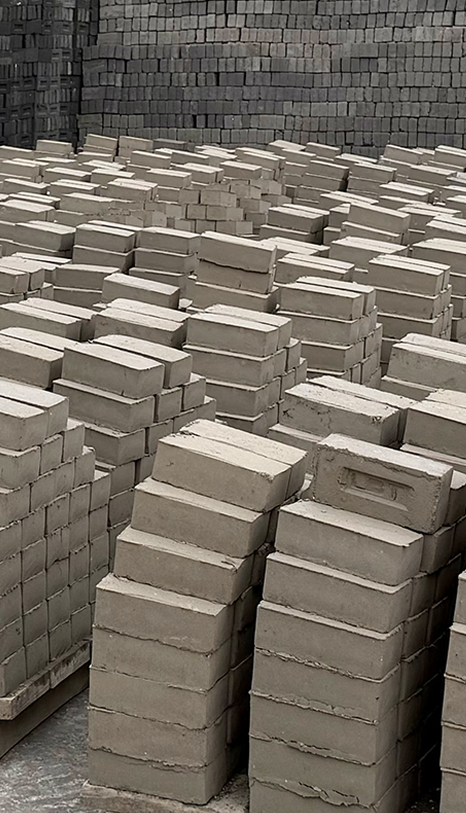 Fly ash bricks stacked at manufacturing plant
